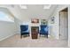 Cozy bonus room with fireplace, skylights and a calming color scheme at 9385 Prairie View Dr, Highlands Ranch, CO 80126