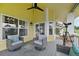 Inviting outdoor porch with comfortable seating, telescope, and view of the landscape at 9385 Prairie View Dr, Highlands Ranch, CO 80126