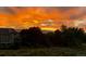 Breathtaking sunset view showcasing the home's location and beautiful surroundings at 9385 Prairie View Dr, Highlands Ranch, CO 80126