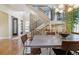 Open concept dining room with a view of the staircase and entryway at 2800 S Dexter Way, Denver, CO 80222