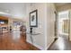 Glass-top console table in entryway near bathroom and living room at 2800 S Dexter Way, Denver, CO 80222