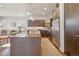 Modern kitchen with a large island and stainless steel appliances at 2800 S Dexter Way, Denver, CO 80222