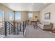 Spacious upper landing with seating area and natural light at 2800 S Dexter Way, Denver, CO 80222