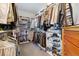 Large walk-in closet with ample shelving and hanging space at 2800 S Dexter Way, Denver, CO 80222