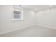 Unfinished basement with a window providing natural light, ready for customization at 1835 S Lincoln St, Denver, CO 80210
