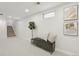 Finished basement with neutral carpeting and natural light at 1835 S Lincoln St, Denver, CO 80210