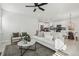 Spacious living room with a comfortable sofa and a modern coffee table at 1835 S Lincoln St, Denver, CO 80210