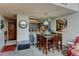 Functional kitchen with stainless steel appliances, ample cabinet space, and a cozy dining area at 10035 E Mexico Ave, Aurora, CO 80247