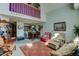 Inviting living space with an open floor plan, high ceilings, and comfortable furnishings at 10035 E Mexico Ave, Aurora, CO 80247