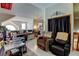 Home office featuring multiple seating options and plenty of desk space at 10035 E Mexico Ave, Aurora, CO 80247