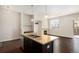Kitchen with granite island, stainless steel appliances, and adjacent living area, ideal for entertaining and everyday living at 301 Inverness S Way # 202, Englewood, CO 80112