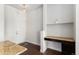 Kitchen with built-in desk space, ideal for a functional workspace alongside modern kitchen amenities at 301 Inverness S Way # 202, Englewood, CO 80112