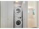 Washer and dryer closet located close to the bedrooms at 301 Inverness S Way # 202, Englewood, CO 80112