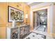 Tastefully decorated lobby with patterned tile flooring and accent furniture, creating an inviting atmosphere at 301 Inverness S Way # 202, Englewood, CO 80112