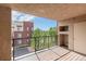 This cozy balcony offers a pleasant view and ample natural light at 301 Inverness S Way # 202, Englewood, CO 80112