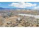 Aerial shot of the neighborhood with mountain views, highlighting the location and nearby shopping centers at 767 Ellis St, Golden, CO 80401