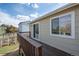 The wooden deck provides a pleasant area to relax outside at 17593 E Temple Dr, Aurora, CO 80015