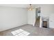 Bright living room featuring vaulted ceiling and a staircase leading upstairs at 17593 E Temple Dr, Aurora, CO 80015