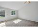 Bright living area features a vaulted ceiling, and ample natural light at 17593 E Temple Dr, Aurora, CO 80015