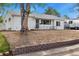 Well-maintained single-story home with a rockscape yard at 5142 S Pennsylvania St, Littleton, CO 80121