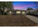 Charming single-story home with a rockscape front yard at 5142 S Pennsylvania St, Littleton, CO 80121
