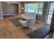Sunlit living room featuring stylish furniture, hardwood floors, and a large window with a view at 5142 S Pennsylvania St, Littleton, CO 80121