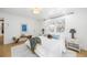 Modern bedroom featuring bright white walls, unique windows, and stylish bedside tables at 14475 Foothill Rd, Golden, CO 80401