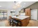 Modern kitchen with a large center island, stainless steel appliances and a skylight at 14475 Foothill Rd, Golden, CO 80401