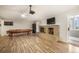 Spacious basement boasts a fireplace and a billiard table, perfect for entertaining at 1285 Spinnaker Trl, Monument, CO 80132