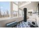 Bright bonus room with large windows and high ceilings, perfect for a home gym at 1285 Spinnaker Trl, Monument, CO 80132