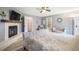 Well lit main bedroom with connecting bathroom and fireplace at 1285 Spinnaker Trl, Monument, CO 80132