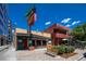 A classic diner front entrance with outdoor seating, perfect for a quick bite at 180 N Cook St # 509, Denver, CO 80206