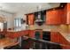 Modern kitchen boasts sleek design, gas cooktop, and stainless steel appliances, creating a chef's dream at 180 N Cook St # 509, Denver, CO 80206