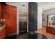 Gourmet kitchen featuring stainless appliances, sleek refrigerator, and modern cabinets, ideal for culinary enthusiasts at 180 N Cook St # 509, Denver, CO 80206