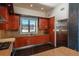 Updated kitchen with stainless steel appliances, tile floors, and granite counters creates a chef-friendly space at 180 N Cook St # 509, Denver, CO 80206