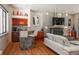 Modern living room with a stone fireplace, bar seating, and sleek design at 180 N Cook St # 509, Denver, CO 80206