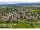 Sprawling community showcasing mature trees and meticulously maintained lawns with mountain views at 10349 W Fair Ave # A, Littleton, CO 80127
