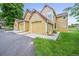 Inviting townhouse with attached garage and well-maintained lawn at 10349 W Fair Ave # A, Littleton, CO 80127
