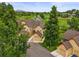 Charming townhome with a 1-car garage and lush landscaping situated on a serene golf course at 10349 W Fair Ave # A, Littleton, CO 80127