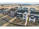 An aerial view of several two-story modern homes in a suburban neighborhood at 3976 Breakcamp Ct, Castle Rock, CO 80108