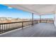 A spacious back deck with a great view is perfect for relaxing or entertaining outdoors at 3976 Breakcamp Ct, Castle Rock, CO 80108
