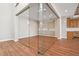 Beautiful room with glass doors to an office area and an open floor plan at 3976 Breakcamp Ct, Castle Rock, CO 80108