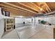 Unfinished basement featuring a workout area, exposed ceiling, and ample space for customization at 3838 Brush Rd, Castle Rock, CO 80108