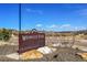 Entrance to Wrangler Park at 2418 Autumn Sage Street featuring lush landscaping and clear blue skies at 3838 Brush Rd, Castle Rock, CO 80108