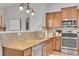 Kitchen with stainless steel appliances and granite countertops at 3838 Brush Rd, Castle Rock, CO 80108