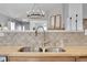 Close-up of kitchen sink and tiled backsplash at 3838 Brush Rd, Castle Rock, CO 80108