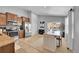 Bright, open kitchen and dining area with stainless steel appliances and tile floors at 3838 Brush Rd, Castle Rock, CO 80108