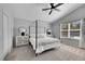 Bright main bedroom with a four poster bed and carpeted floor at 3838 Brush Rd, Castle Rock, CO 80108