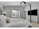 Light filled main bedroom with vaulted ceiling and large bed at 3838 Brush Rd, Castle Rock, CO 80108