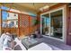 Relax on this covered patio with decorative lattice, offering a cozy outdoor living space at 3838 Brush Rd, Castle Rock, CO 80108
